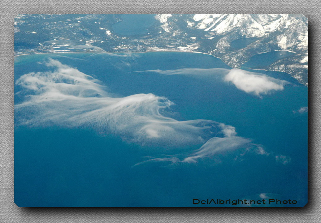 Bird cloud formation over Lake Tahoe by Del Albright