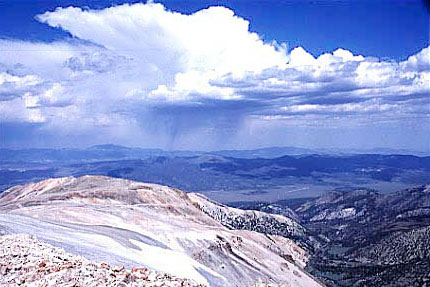 Storm clouds and virga on top of the Sweetwater Mountains of CA