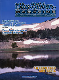 Snow reflecting on lake; BlueRibbon Magazine Cover Image by Del Albright