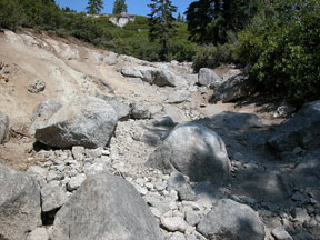 Wentworth Springs Road with big rocks and boulders of trail access to Rubicon Trail