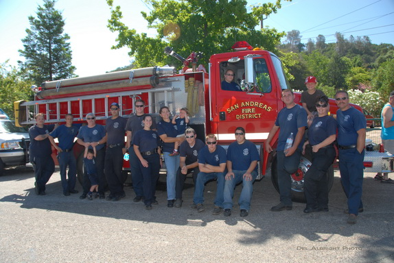 San Andreas Fire firefighters in front of truck