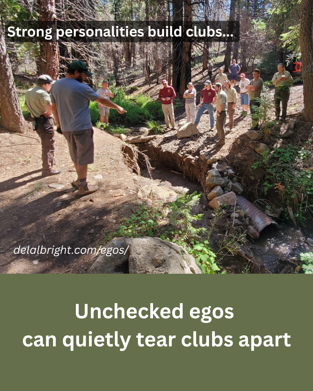 Volunteers in field discussing work project with out egos